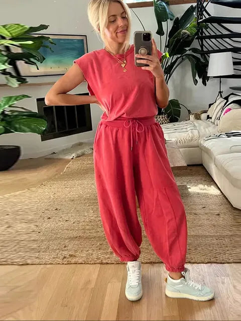 Brisella | Bequemer Jumpsuit mit Taillenband